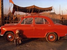 Pilgrim and Ambassador car, Kumbh Mela, Prayag, Uttar Pradesh, 1977