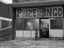 Chris Killip, Child Outside Bingo Parlor, West End, Newcastle 1975