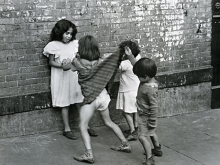 Untitled, New York (boy lifting girls skirt)