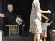 Untitled, New York (old woman in doorway with black and white dog), 1976