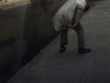 Untitled, New York (man with garment bag on back)
